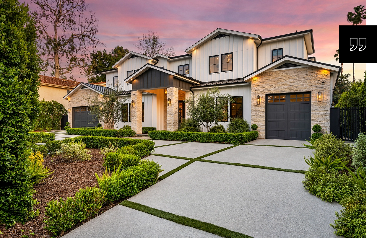 Modern house with landscaped front yard.