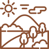 Mountain landscape with sun and trees icon.